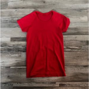 woman’s red swiftly tech short sleeve!